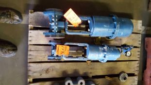 Lot of two assorted valves with actuators.