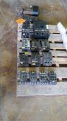 Lot of assorted circuit breakers, starters, valves, and motor etc. On two pallets.