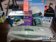 Lot of office equipment, includes electronic bench scale, electric stapler, Fellowes laminator,