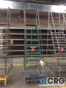 9-step rolling steel warehouse stock ladder, approx 7'6" standing height