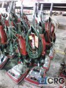Lot of (4) Sanitaire commercial upright vacuums