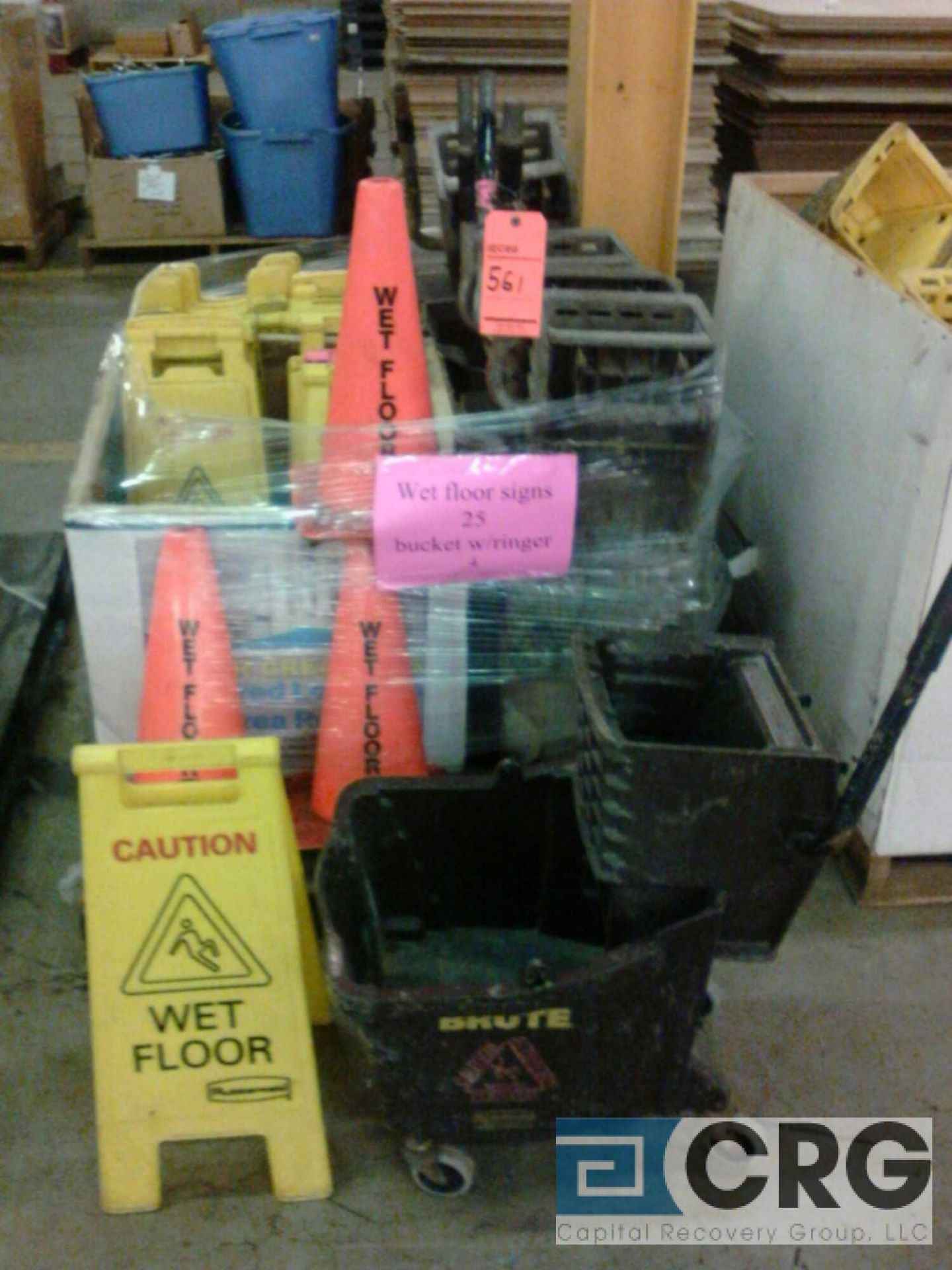 Lot of (25) wet floor signs, and (4) mop buckets w/ringers