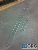 Lot of (560) clip-in fencing and dividers for gondola type fixtures, (385) 3" x 12" dividers, (