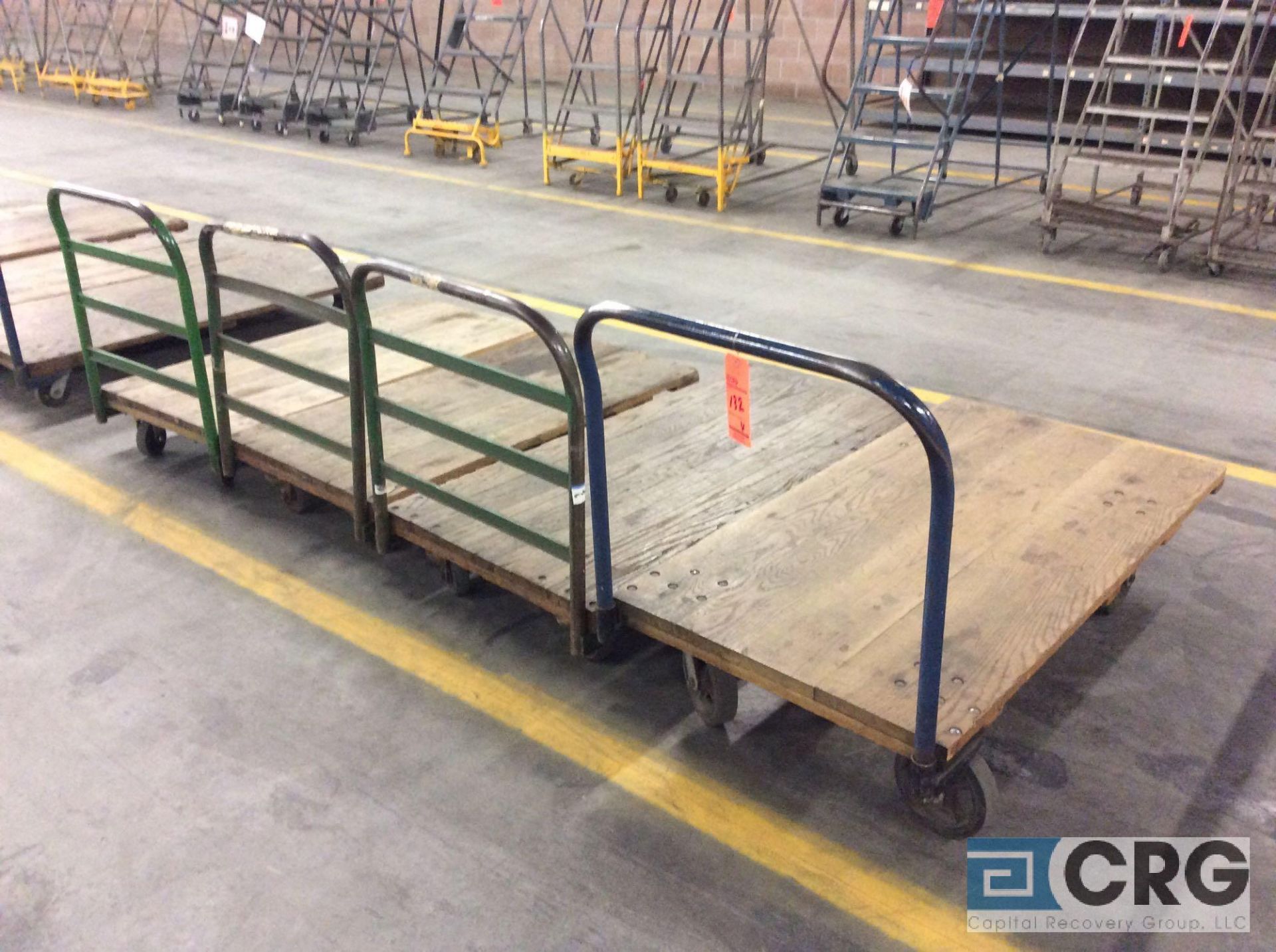 Lot of (4) asst wood deck platform trucks