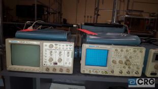 Lot of (2) assorted oscilloscopes, including one Tektronix 420, and one Tektronix 2445, with (2)