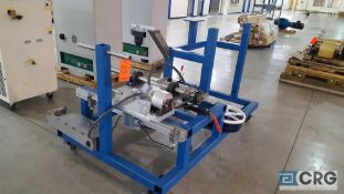 Custom winder machine with linear ball screw actuator with linear slides, and a high precision