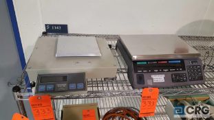 Lot of two assorted digital scales. One Pennsylvania model 7500, and one Digi model DC-788. And