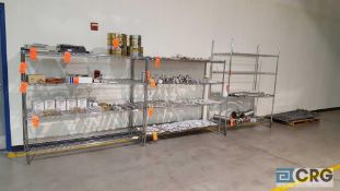 Lot of five assorted sections metro type metal shelving, 3 with casters, one needs assembly. No