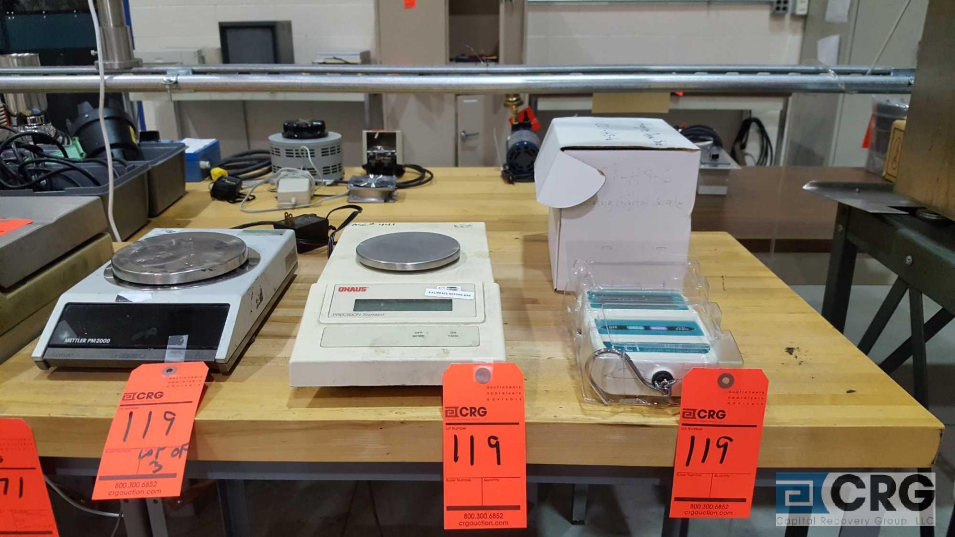 Lot of (3) assorted scales, including (1) Mettler PM2000, (1) Ohaus TS600S, and (1) CCI, HS-6