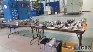 Lot of assorted pressure controllers, connectors, clamps valves, etc. Tables excluded.