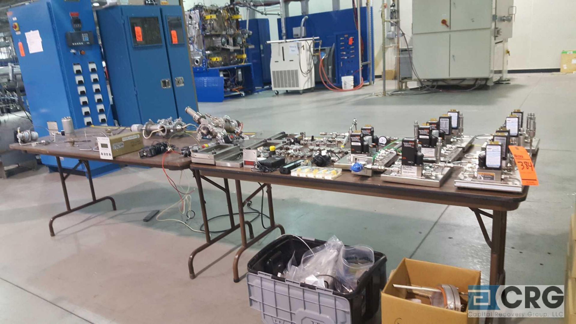 Lot of assorted pressure controllers, connectors, clamps valves, etc. Tables excluded.