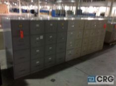 Lot of ten assorted four drawer, letter size, metal file cabinets.