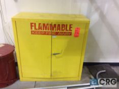 Lot of two assorted items, including one 2 door flammable storage cabinet and 1 safety can.