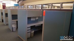 Lot of assorted partitioned office cubicles, with 6 work stations, with desks, over shelves, and