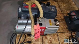 Lot of (2) assorted vacuum pumps.