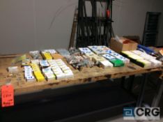 Lot of assorted fuses, etc. Contents of four bench tops, benches excluded.