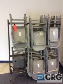 Lot includes two assorted portable folding chair racks and 85 assorted folding metal chairs with