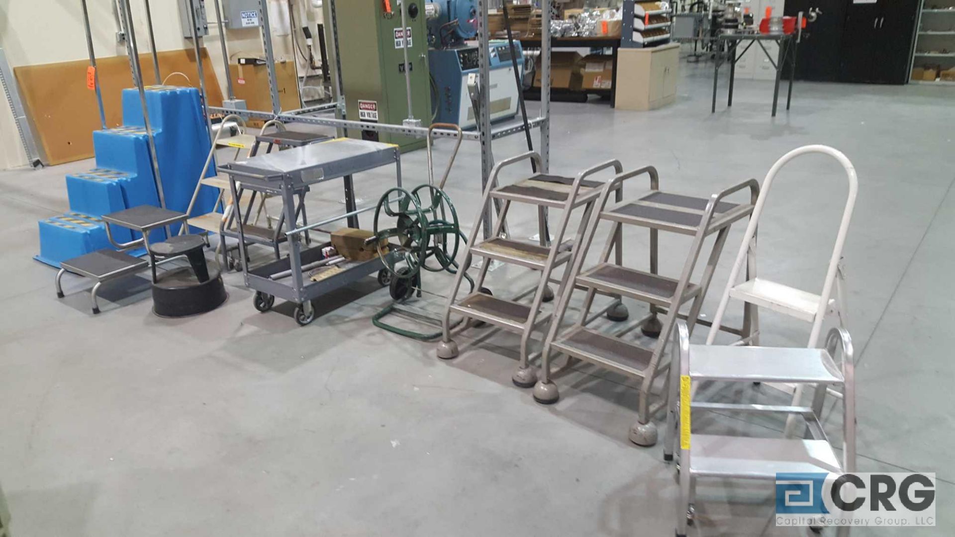 Lot of assorted portable stock ladders, cart, and hose reel. - Image 2 of 2