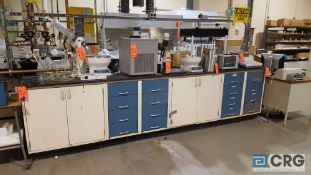 Lot of assorted lab cabinets and tables, etc., no contents.