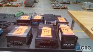 Lot of eleven assorted items including two Omega Digicators, one Omega DP80 series monitor, one