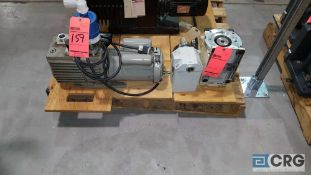 Lot includes Leybold Trivac, vacuum pump, and assorted pump parts, etc.