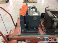 Lot of two assorted vacuum pumps, one Welch Duo-Seal Vacuum Pump, model 1402, serial 100017, and one