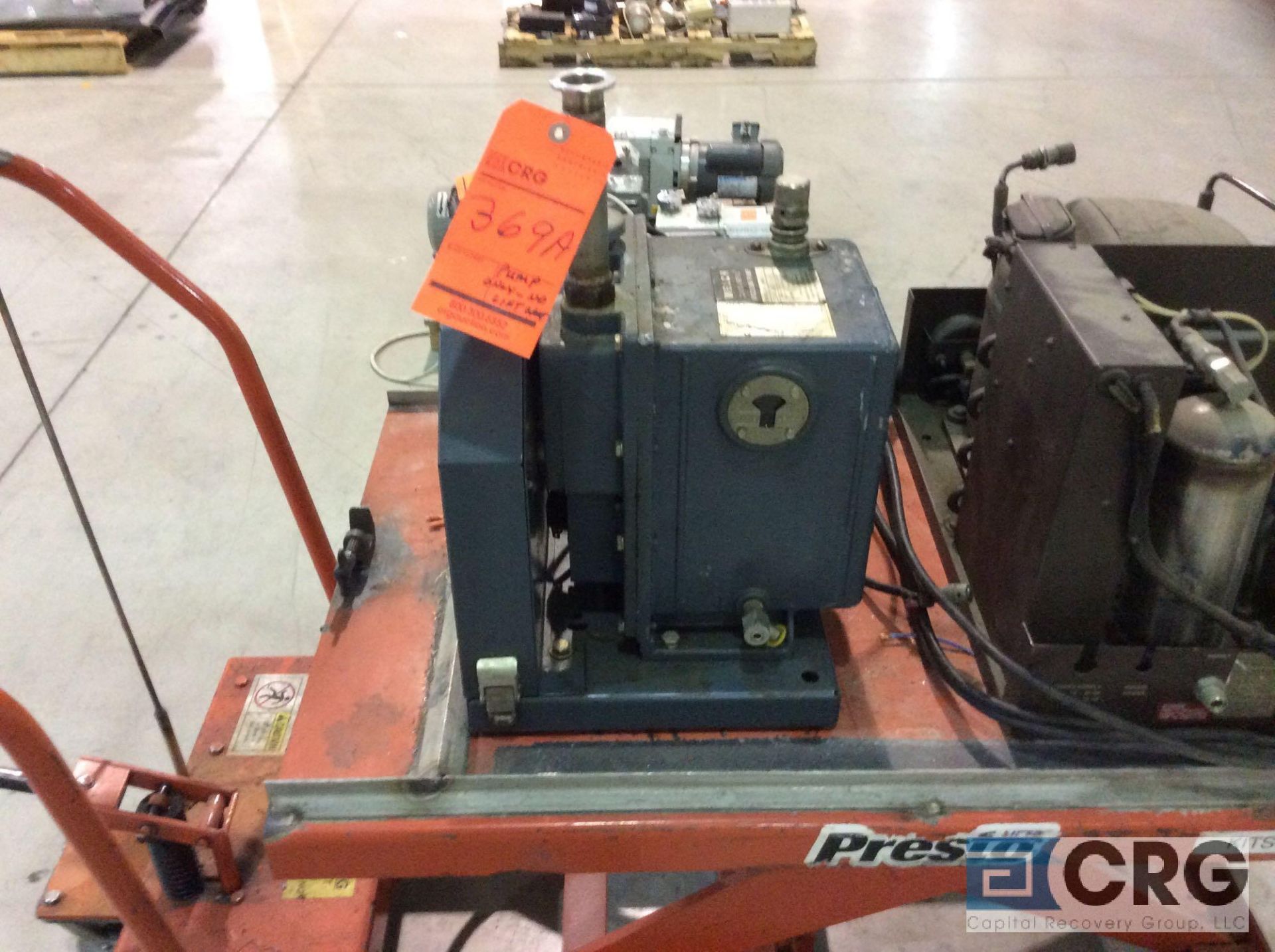 Lot of two assorted vacuum pumps, one Welch Duo-Seal Vacuum Pump, model 1402, serial 100017, and one