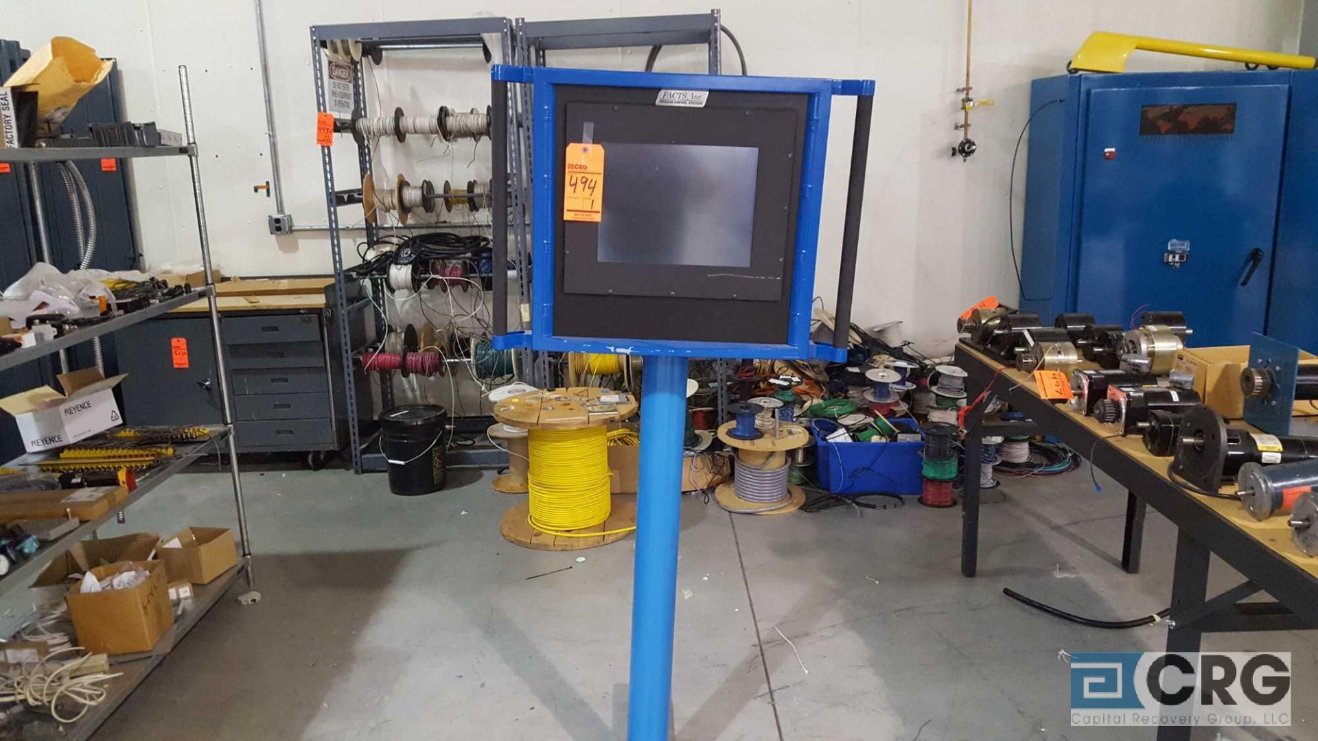 One Facts Inc process control system, touch screen panel, mounted on stand.