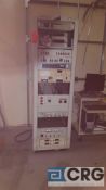 HP Rack mount cabinet with assorted controls, multimeters, power supplies, and related equipment