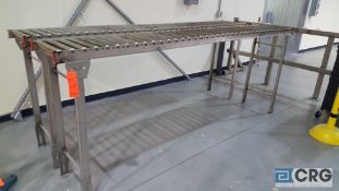 Lot includes 2 sections of 10' x 14" roller conveyor.