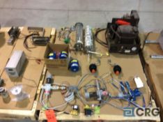 Lot of assorted valves, filters, gages, water tubes, and lights, Cryo-Torr high vacuum pump,