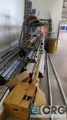 Lot of assorted electical conduit, etc., with one stock rack.