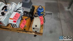 Lot of (2) assorted vacuum pumps.