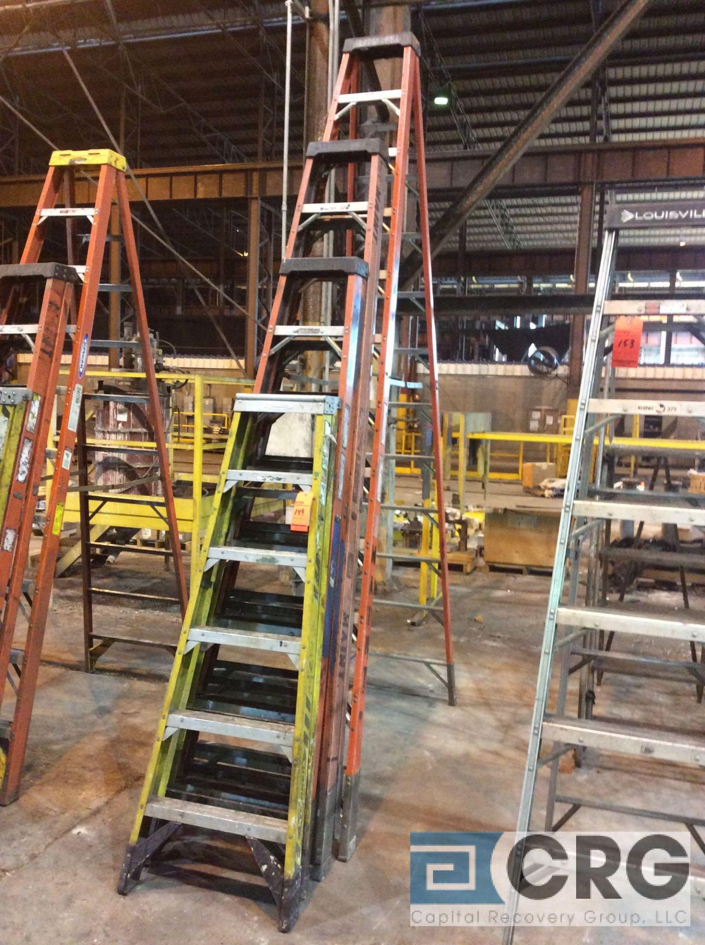 Lot of (4) fiberglass step ladders including 6', 8', 10' and 12'