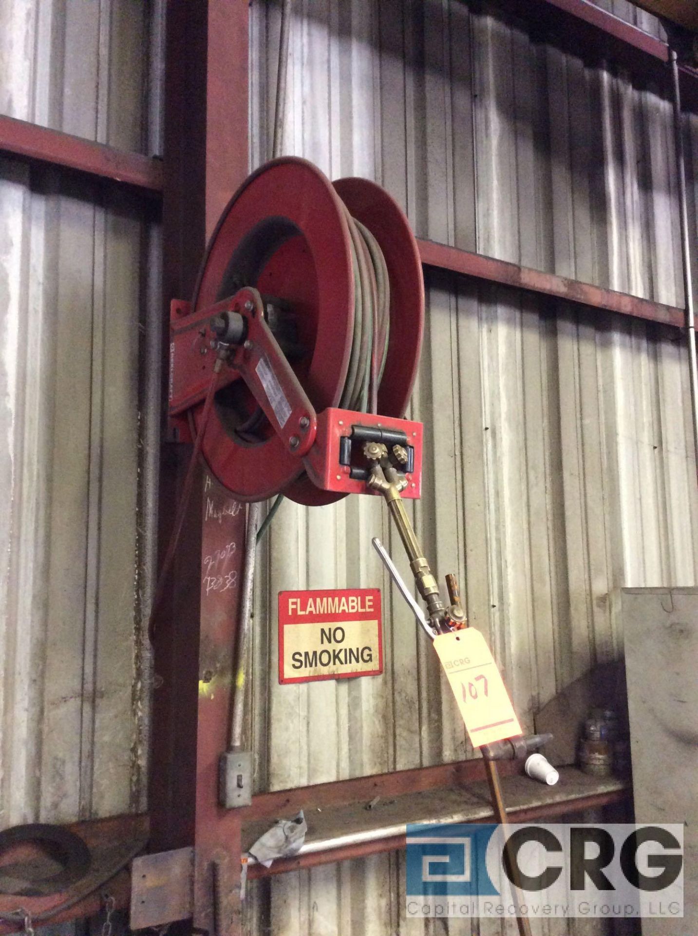 Reel Craft retractable hose reel with approx 50' torch line and 16" cutting torch