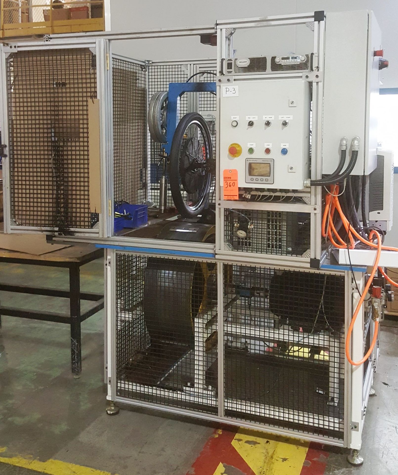 Wheel durability tester w/ ABB switch, motors, compressors in transportable metal/wire structure