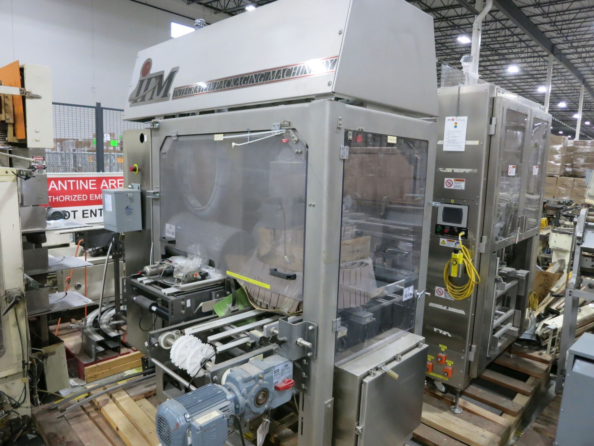 Integrated Packaging Machinery Cartoner (Tray Former) - Used ONCE, Nordson sealer and infeed