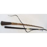 A folk art carved wood walking cane, decorated a coiled serpent with a leather handle, 80 cm long,