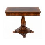 An early Victorian rosewood card table, on an octagonal baluster column and circular platform base,