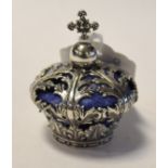 A novelty silver pincushion, in the form of a crown, 4.