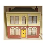 A Georgian style doll's house, 58 cm wide, a lady's fur coat, 110 cm long,