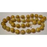 A string of thirty five Eastern bone prayer beads,