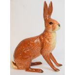 A Beswick Hare, seated, 1025, cracked,