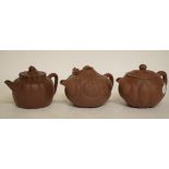 A Chinese Yixing earthenware teapot and cover, of melon form, 9.