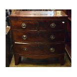 An early 19th century mahogany bow front chest, of two short and two long drawers, 86.