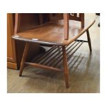 An Ercol elm low table, 104 cm wide, a glazed bookcase on cupboard, four G Plan chairs,