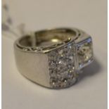 An Art Deco style diamond ring, in a white coloured metal mount, approx.