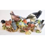 A Beswick Magpie, 2109, a Jay, 2417, a White Throat, 2106A, and other birds, all gloss,