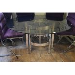 A Merrow Associates tinted glass and chrome dining table, 148 cm diameter,