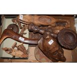 Assorted tribal items, including a carved wood face mask,
